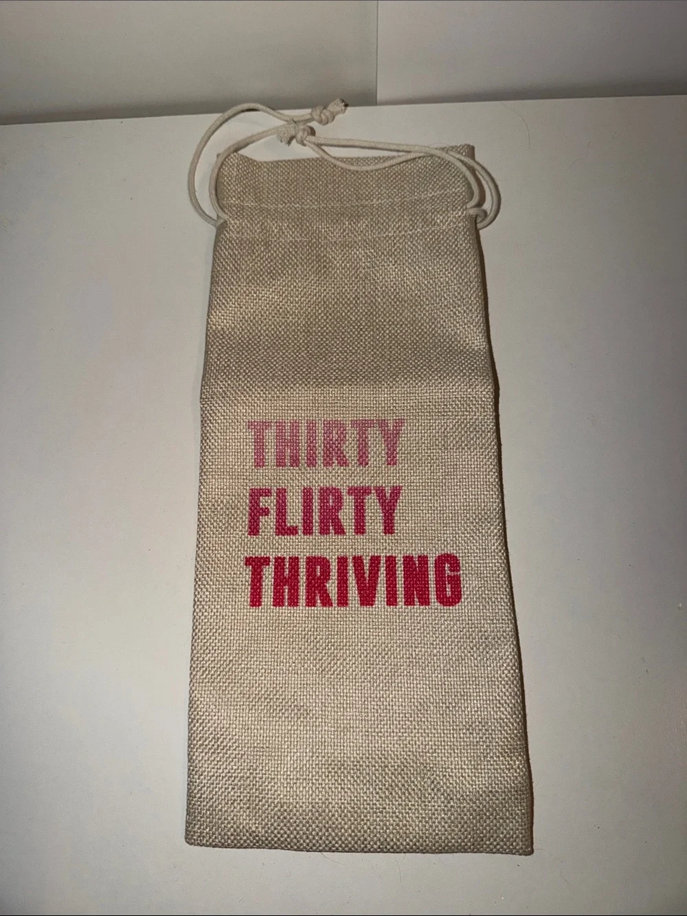 Hobby Lobby Beige Drawstring Pouch with Pink Lettering